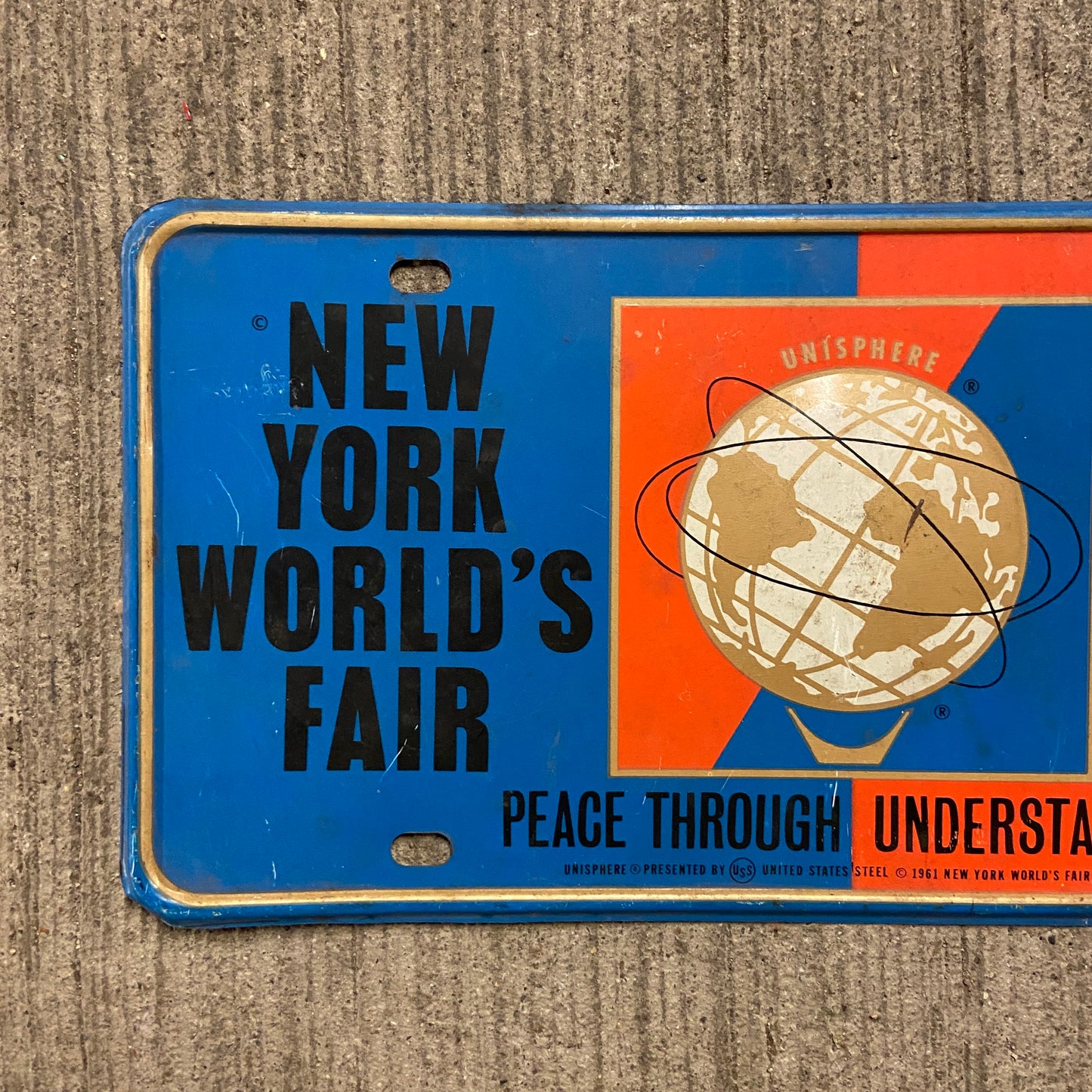 1964 New York World's Fair License Plate Unisphere Embossed Booster Plate