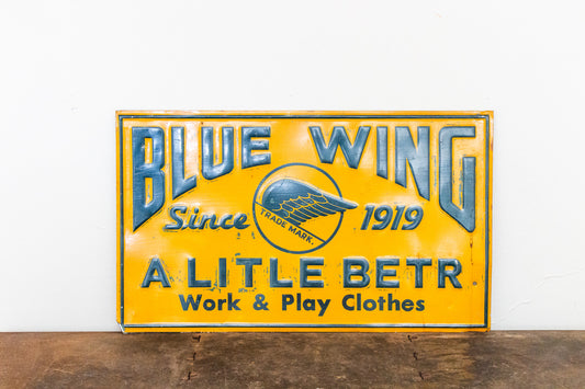 Blue Wing Clothing Sign Vintage Tin Advertising Signage Wall Decor