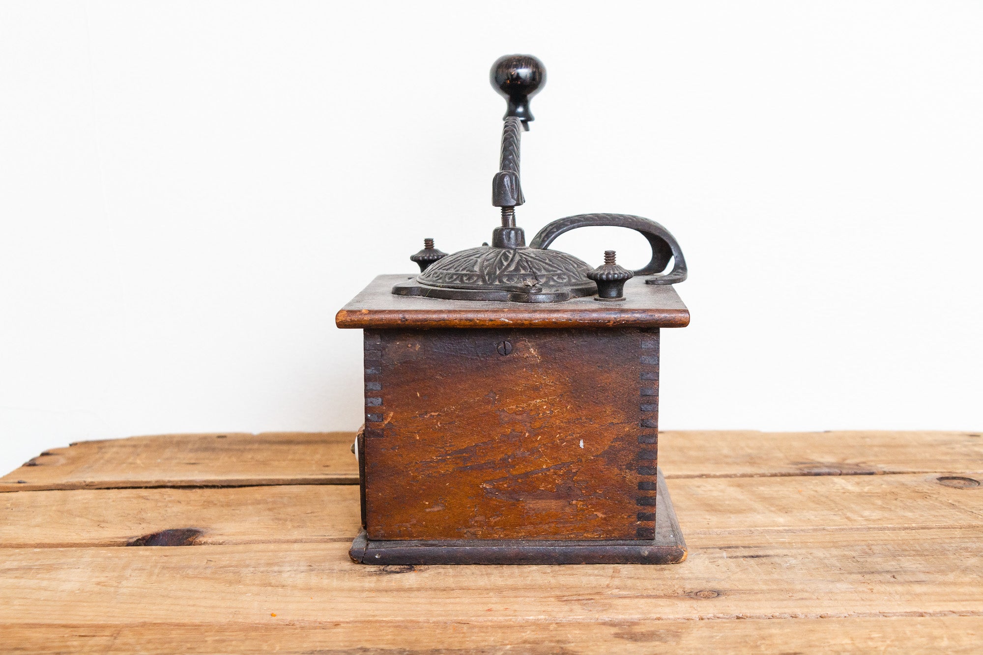 Visit the past with this charming, antique wooden coffee grinder. This aged rustic coffee grinder is shop epic rustic Farmhouse decor.